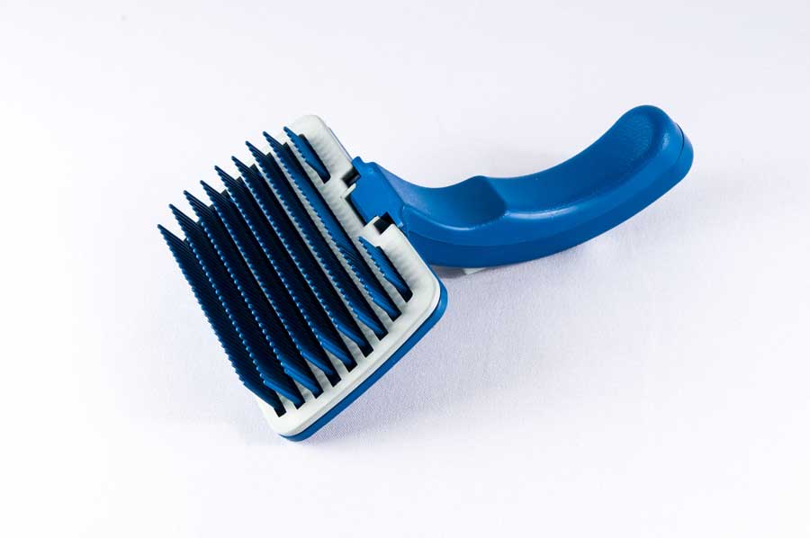 Types de brosse pour chien : l'étrille